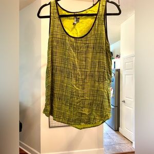 Fun and flirty French Connection Black and Chartreuse top. Size 10.